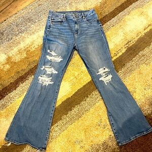 AMERICAN EAGLE DISTRESSED HIGH-rise FLARED blue JEANS….Size 12